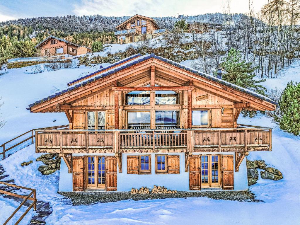 a log home in the snow at Chalet Gingembre 8 by Interhome in Nendaz