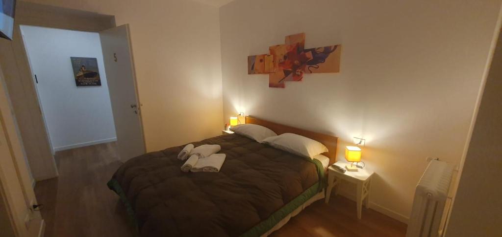 Postel nebo postele na pokoji v ubytování Max Rooms Bergamo