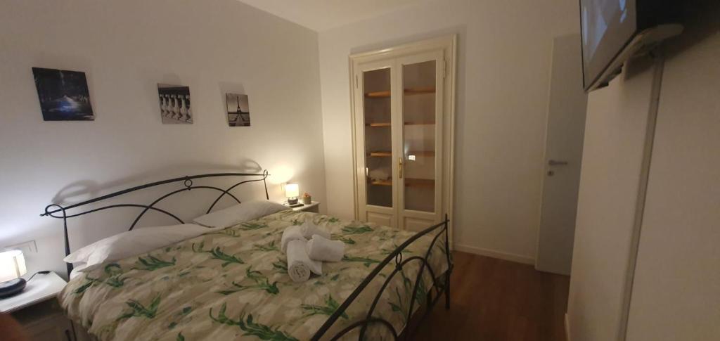 Postel nebo postele na pokoji v ubytování Max Rooms Bergamo