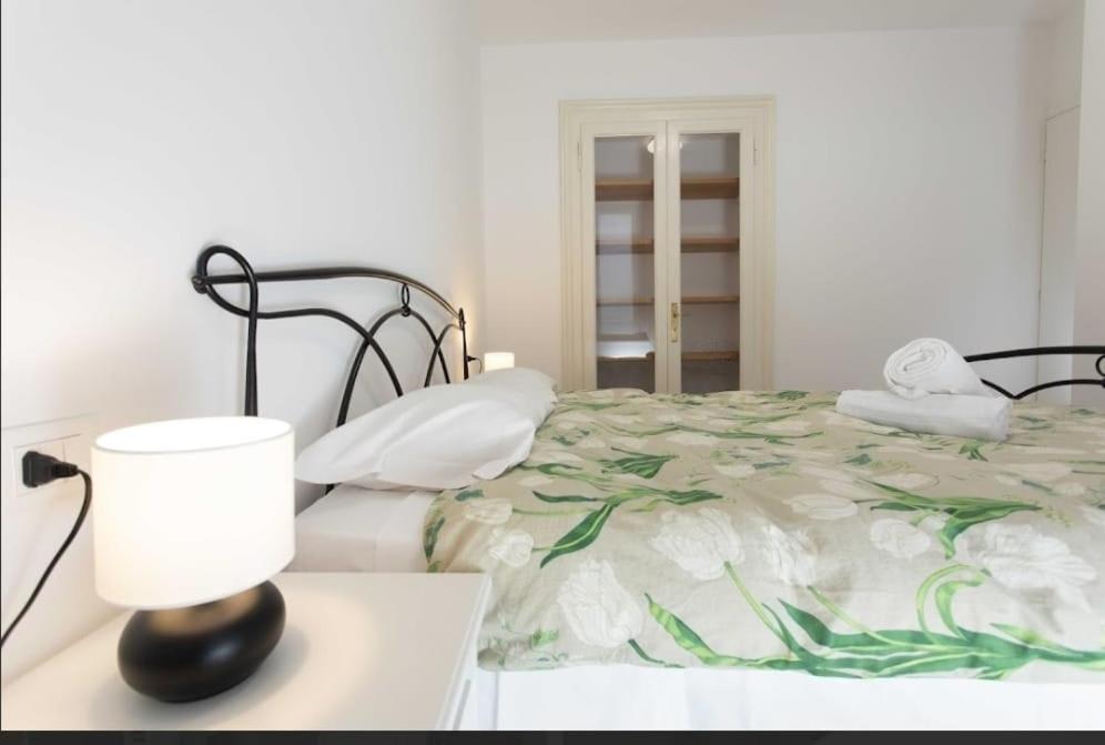 Postel nebo postele na pokoji v ubytování Max Rooms Bergamo