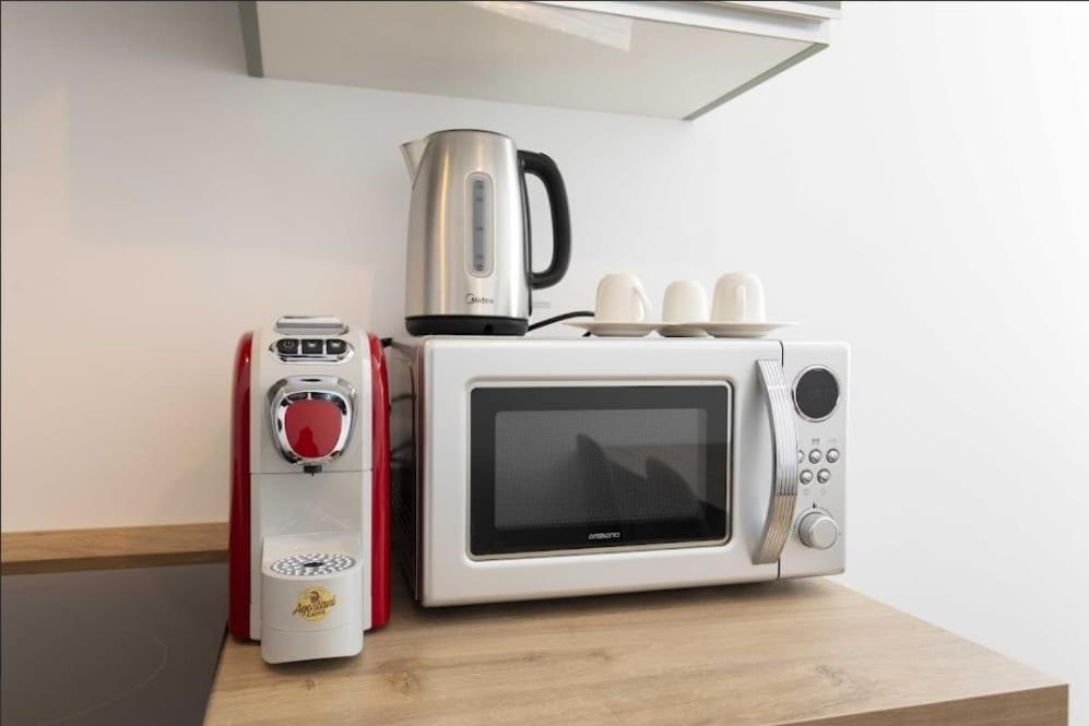 Kuchyň nebo kuchyňský kout v ubytování Max Rooms Bergamo