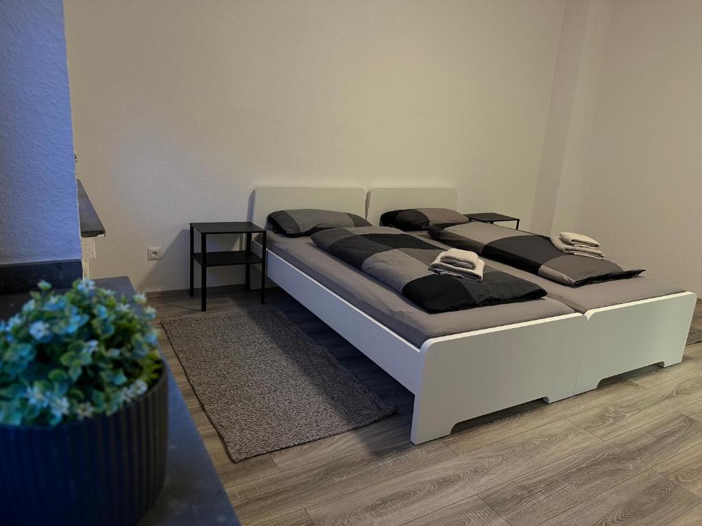 a bedroom with two beds in a room at areahome in Oberhausen