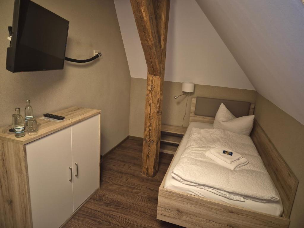 Postel nebo postele na pokoji v ubytování Teutsche Schule