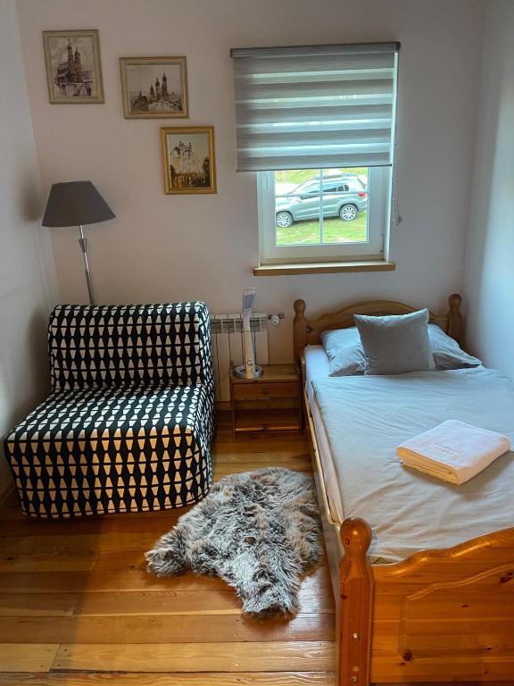 Postel nebo postele na pokoji v ubytování Chybotek Premium