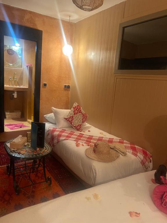 Postel nebo postele na pokoji v ubytování Riad Eva
