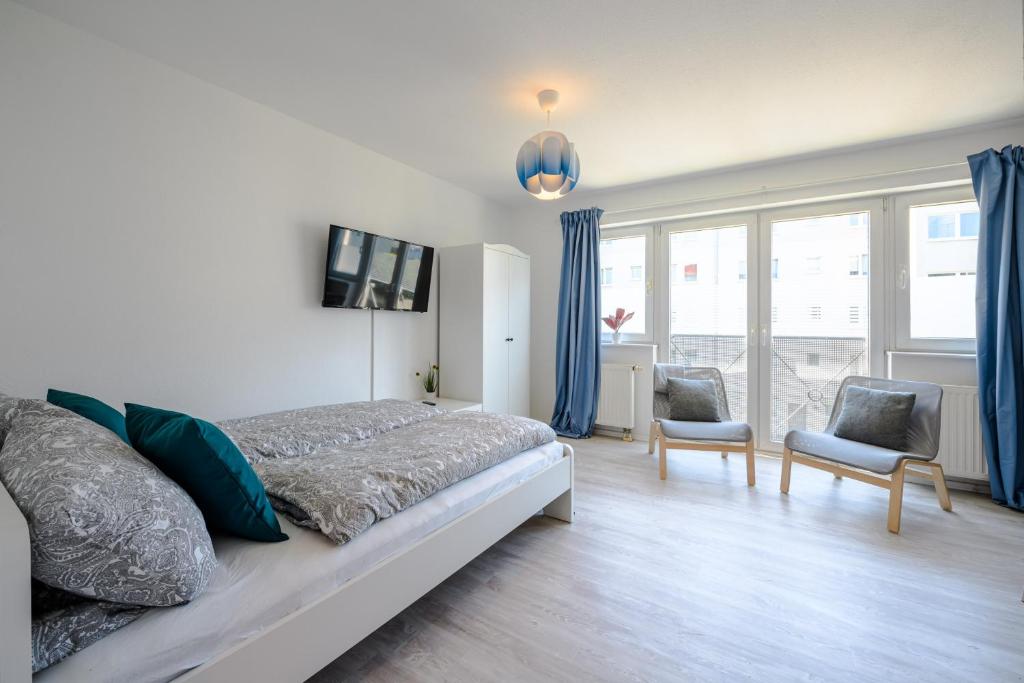 Postel nebo postele na pokoji v ubytování Helles Apartment in TOP-Lage inklusive Parkplatz, WLAN