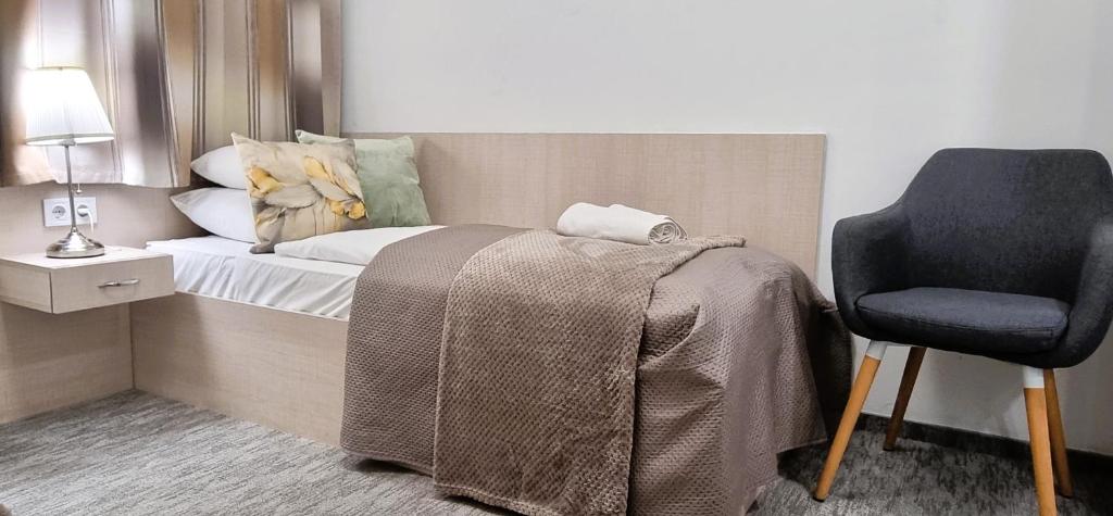 Postel nebo postele na pokoji v ubytování Hotel Három Gúnár