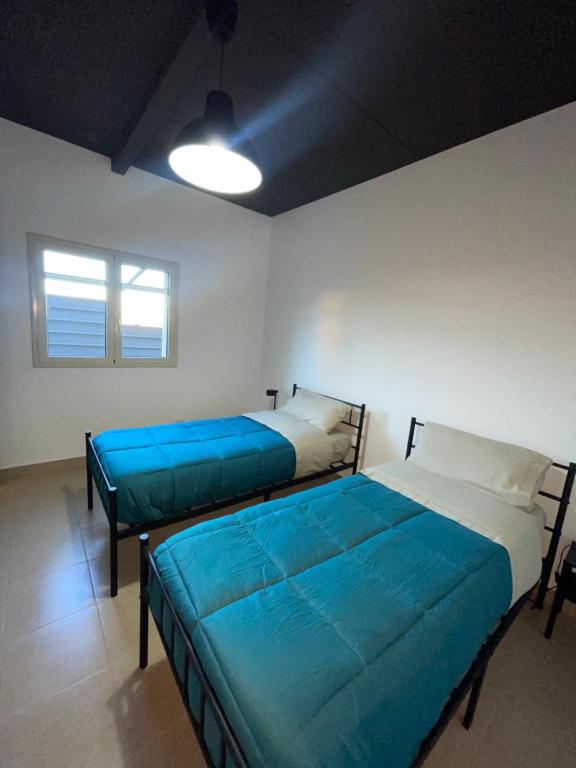 Postel nebo postele na pokoji v ubytování B&b Vittoria House