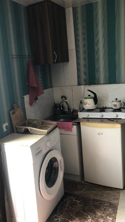 Kuchyň nebo kuchyňský kout v ubytování Apartment Zaziashvili 30