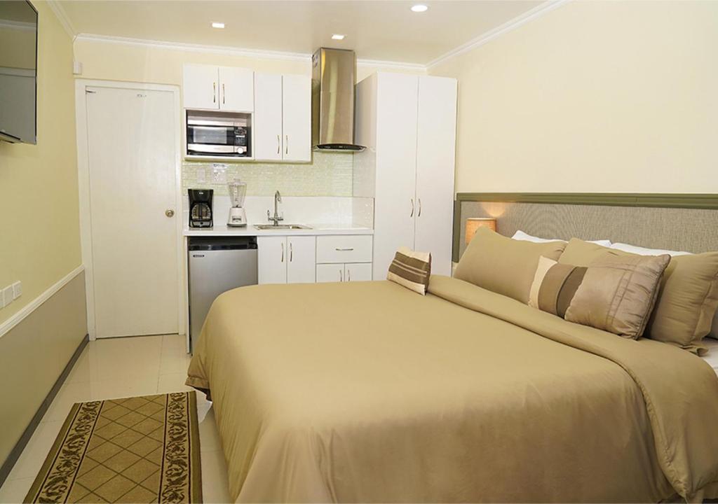 Kuchyň nebo kuchyňský kout v ubytování Yoyita Suites Aruba