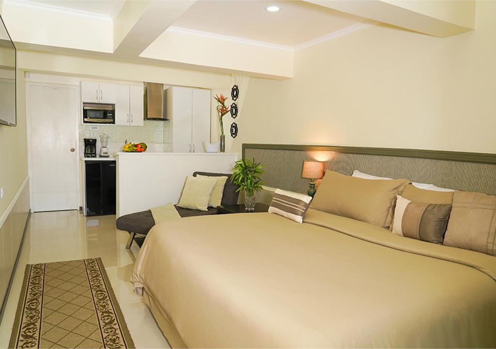 Kuchyň nebo kuchyňský kout v ubytování Yoyita Suites Aruba