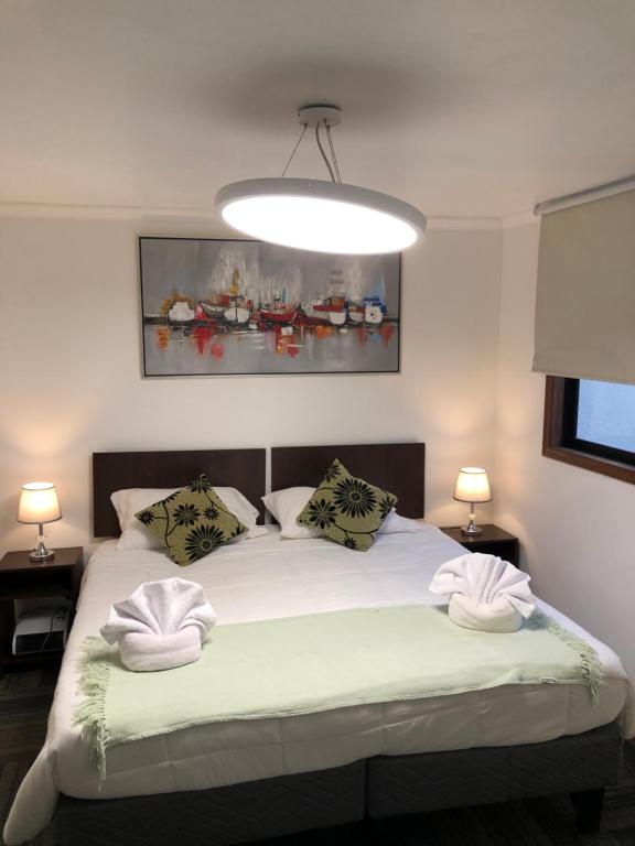 Postel nebo postele na pokoji v ubytování Resplendor Hotel