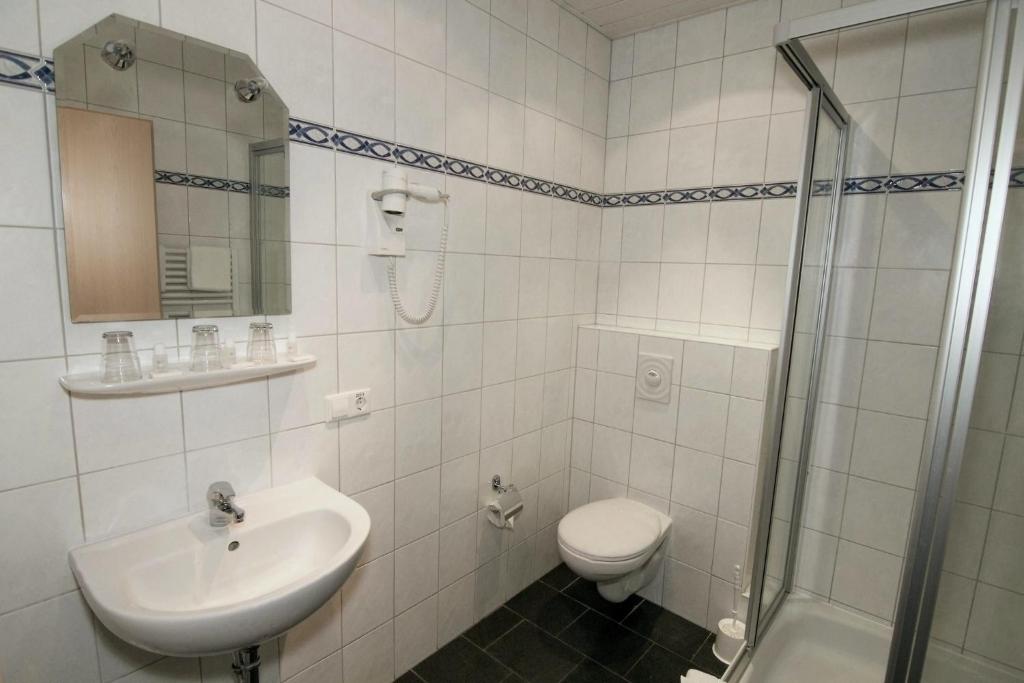 Koupelna v ubytování Hotel Avalon