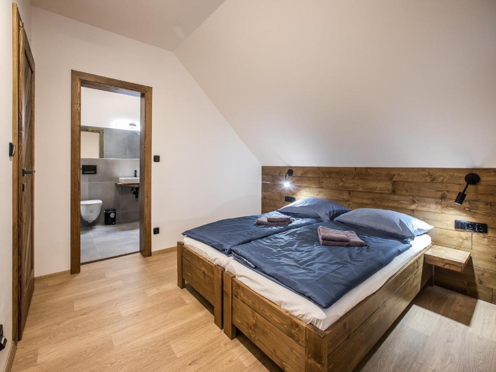 Postel nebo postele na pokoji v ubytování Villa in Bedrichov near ski resort