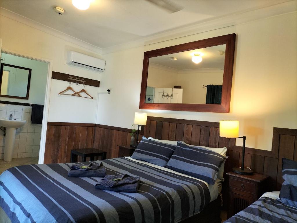 Postel nebo postele na pokoji v ubytování Daintree Riverview Lodges