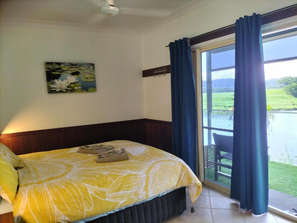 Postel nebo postele na pokoji v ubytování Daintree Riverview Lodges