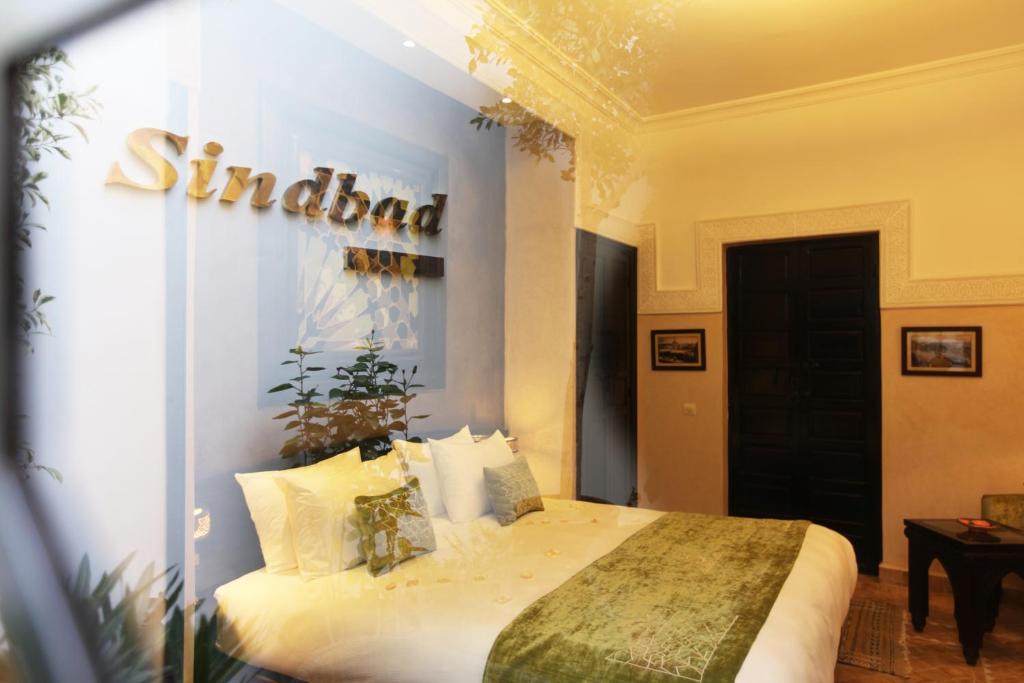 Postel nebo postele na pokoji v ubytování Riad Monceau