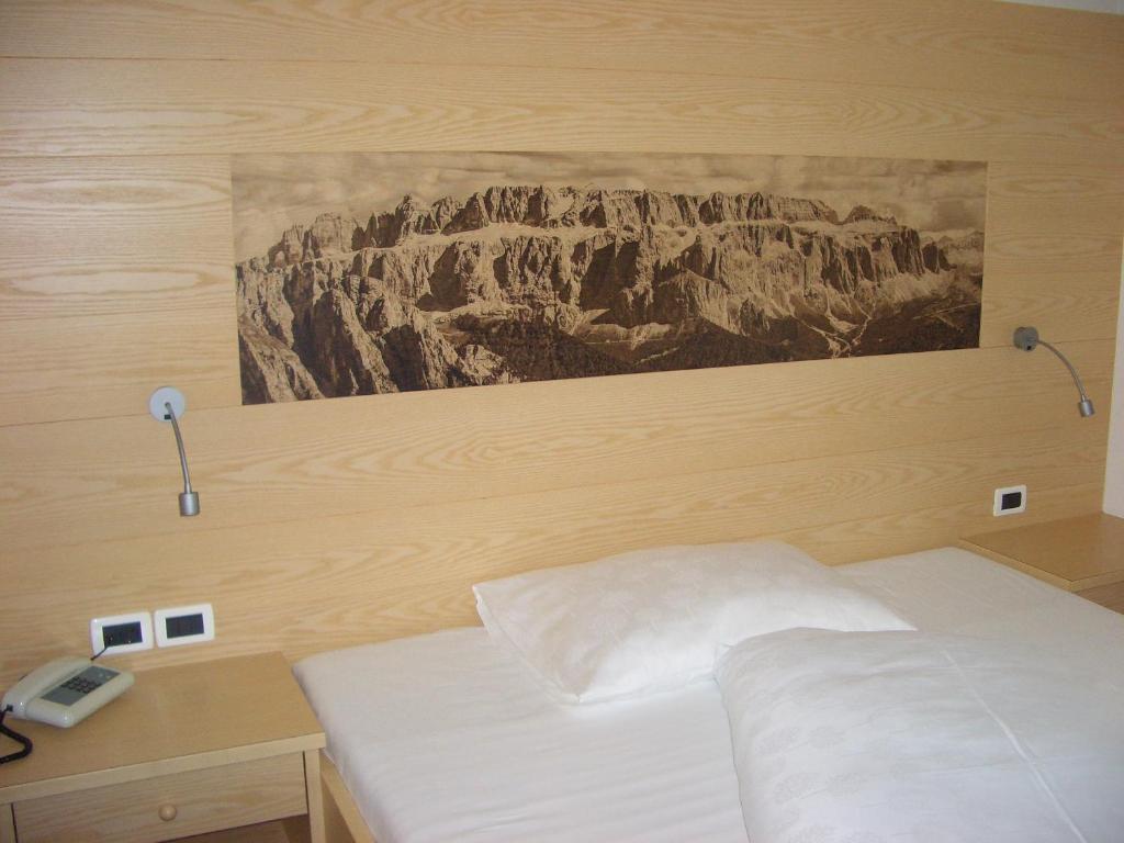 Postel nebo postele na pokoji v ubytování Garni-Hotel Pichler