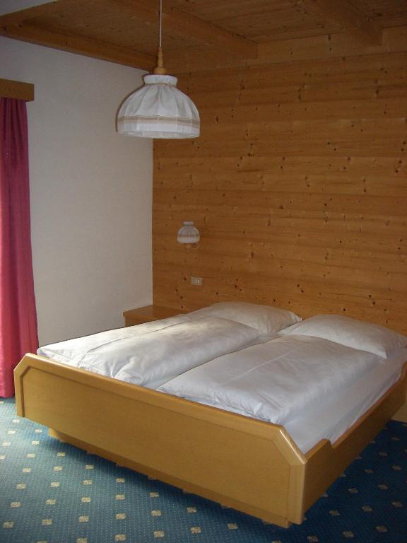 Postel nebo postele na pokoji v ubytování Garni-Hotel Pichler