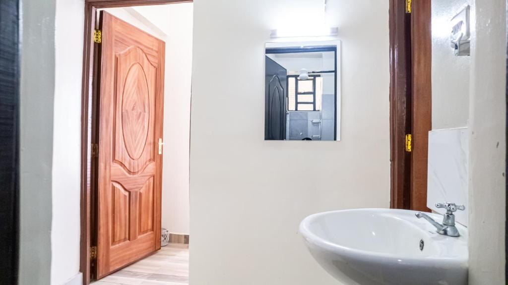 Koupelna v ubytování Cosy Flamingo furnished apartments