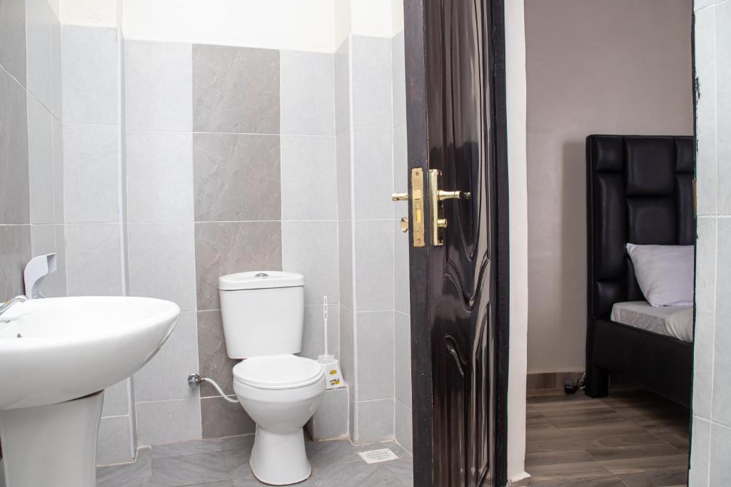 Koupelna v ubytování Cosy Flamingo furnished apartments
