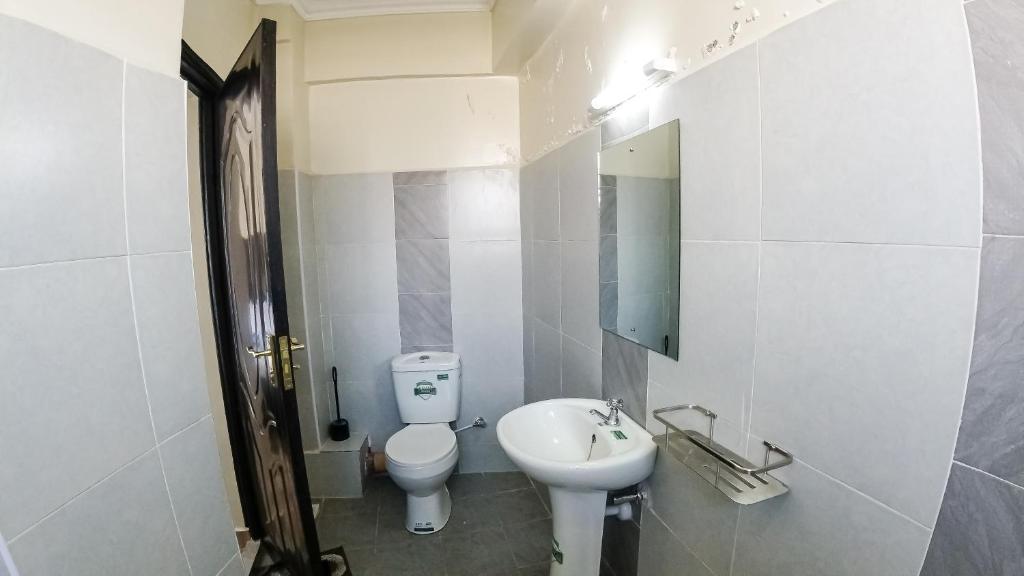 Koupelna v ubytování Cosy Flamingo furnished apartments