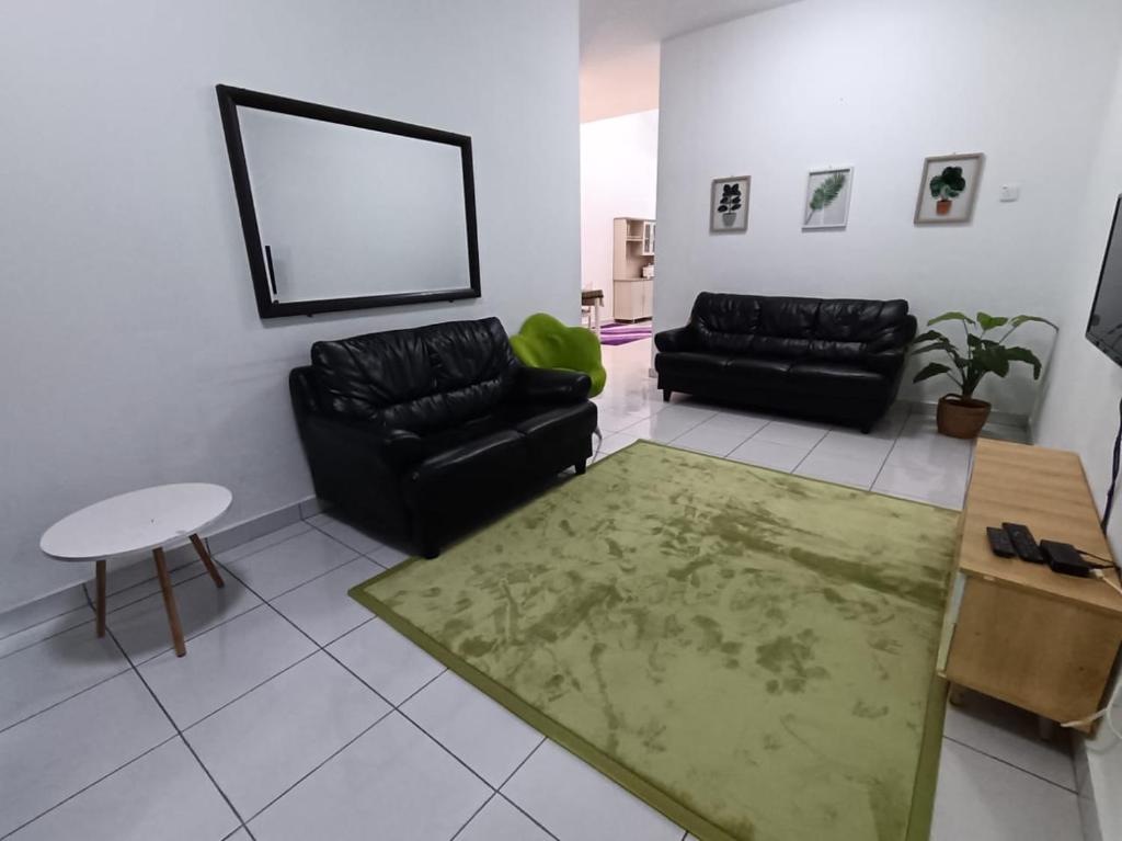 Χώρος καθιστικού στο Jitra Binjal Homestay