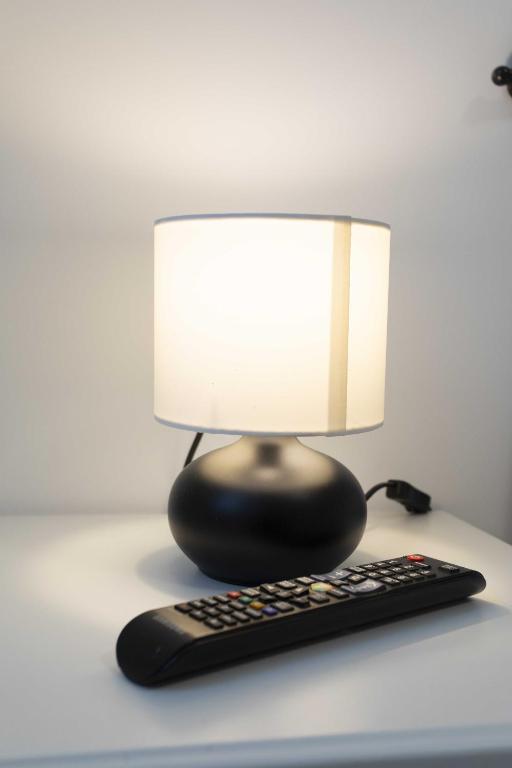 TV a/nebo společenská místnost v ubytování Max Rooms Bergamo