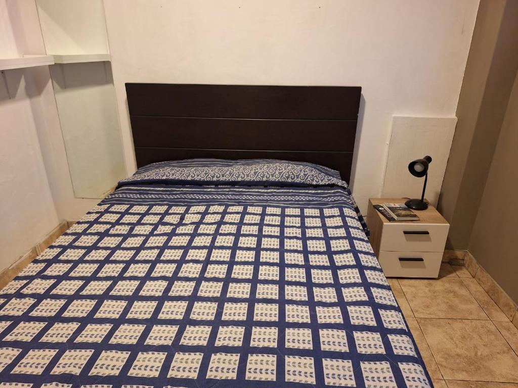 Postel nebo postele na pokoji v ubytování Hostel rivendell lima