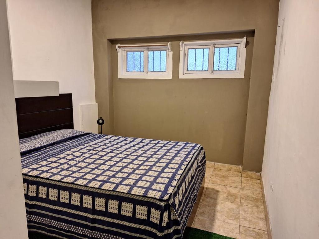 Postel nebo postele na pokoji v ubytování Hostel rivendell lima
