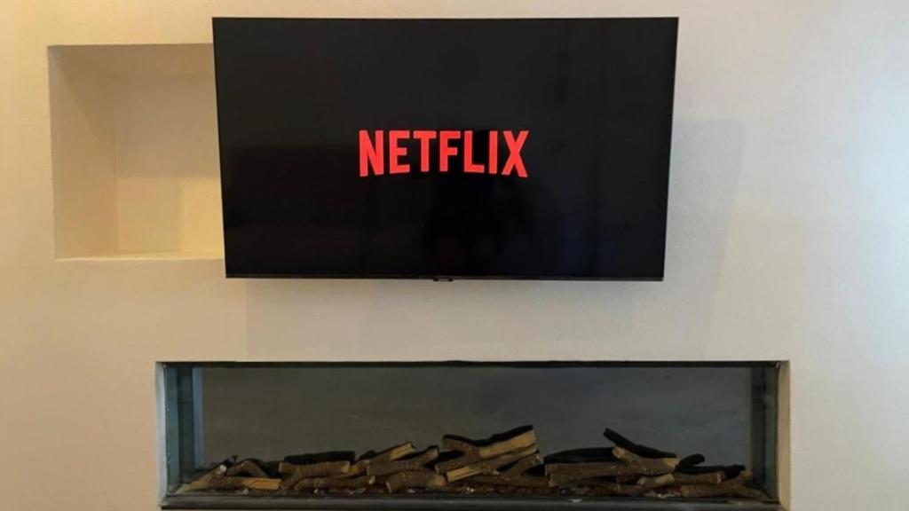 TV a/nebo společenská místnost v ubytování Scarlet