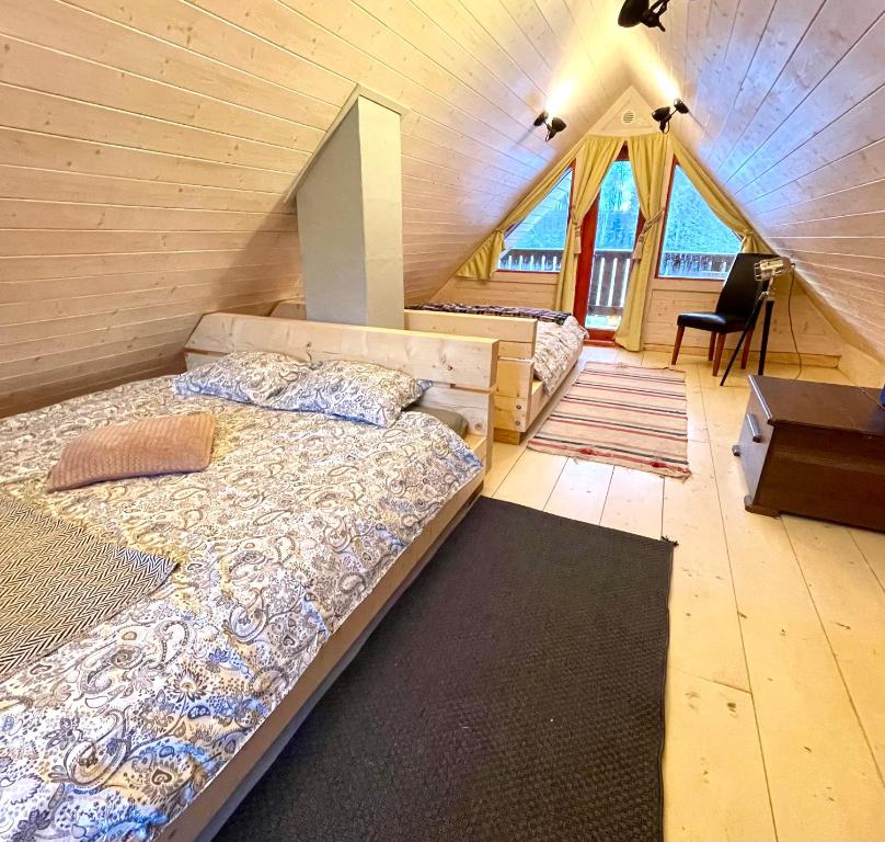 Postel nebo postele na pokoji v ubytování Kakerdaja Private Sauna