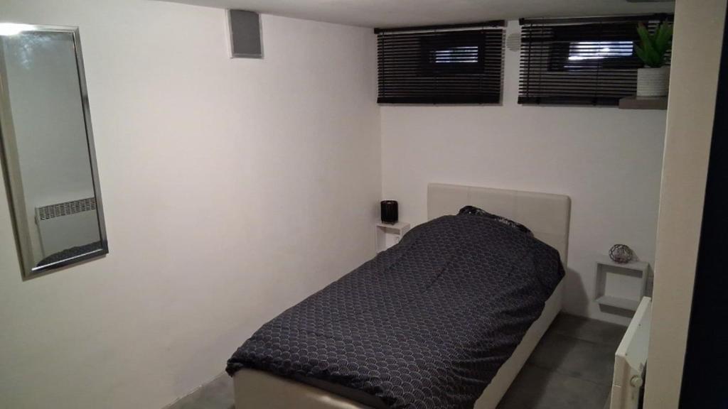 Postel nebo postele na pokoji v ubytování Petit coin de paradis