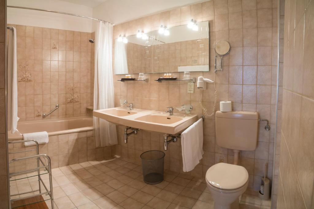 Koupelna v ubytování Hotel Bajazzo