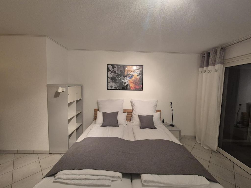 Postel nebo postele na pokoji v ubytování Ferienwohnung Hirsch