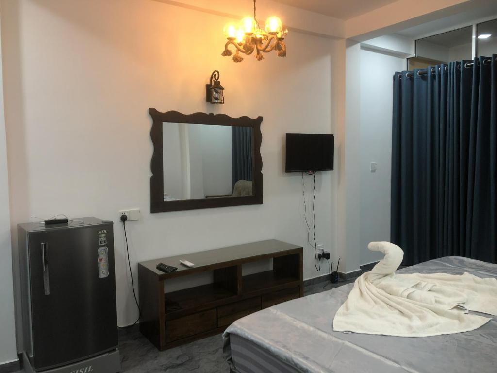 Postel nebo postele na pokoji v ubytování Solomon Beach Hotel