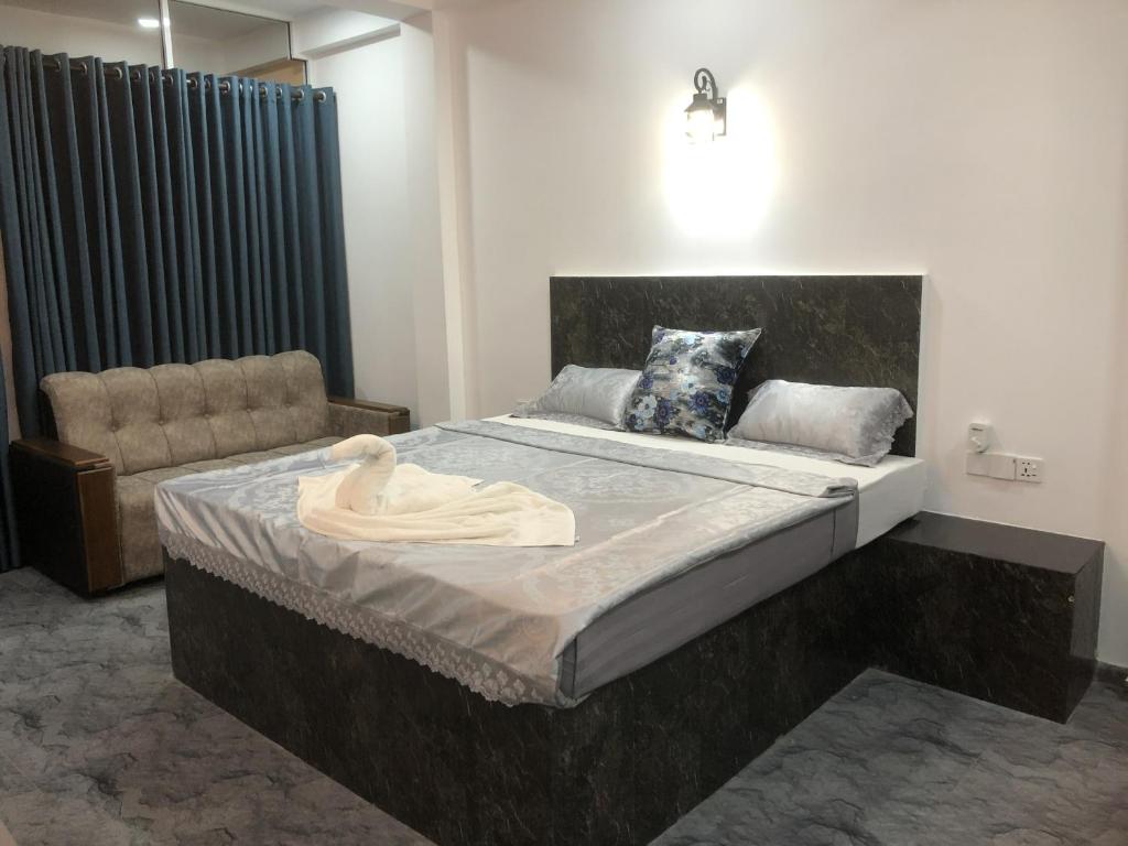 Postel nebo postele na pokoji v ubytování Solomon Beach Hotel