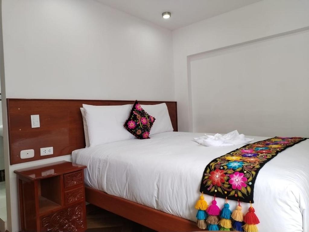 Kantu hotel客房内的一张或多张床位