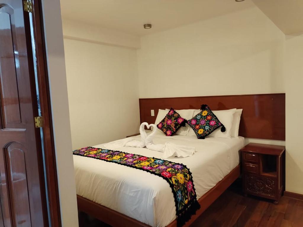Kantu hotel客房内的一张或多张床位