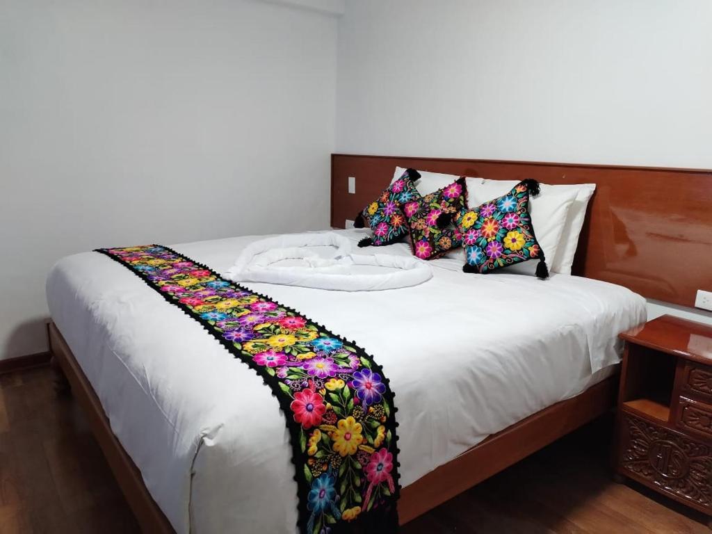Kantu hotel客房内的一张或多张床位