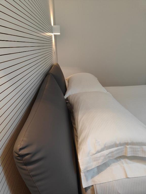 Postel nebo postele na pokoji v ubytování Borgo di Ponte Holiday Apartments & Rooms