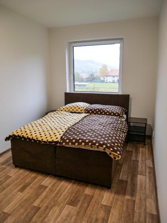 Postel nebo postele na pokoji v ubytování Apartmánový byt Karolína