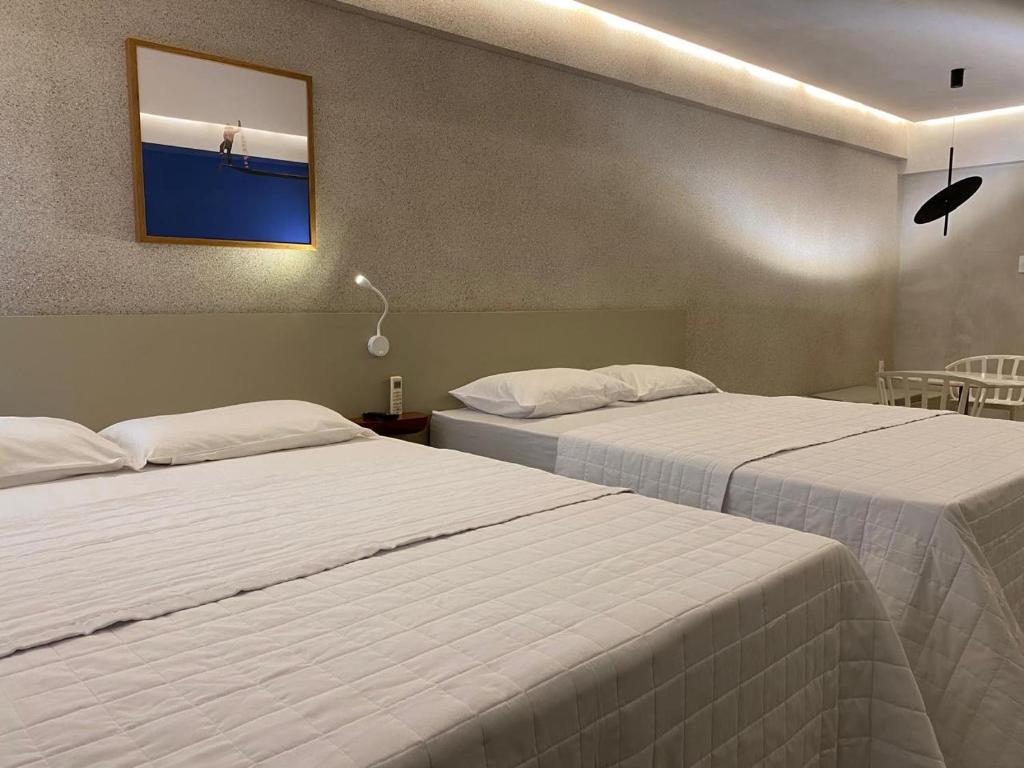 Postel nebo postele na pokoji v ubytování Loft 1 Edf celita Franca Business hotel