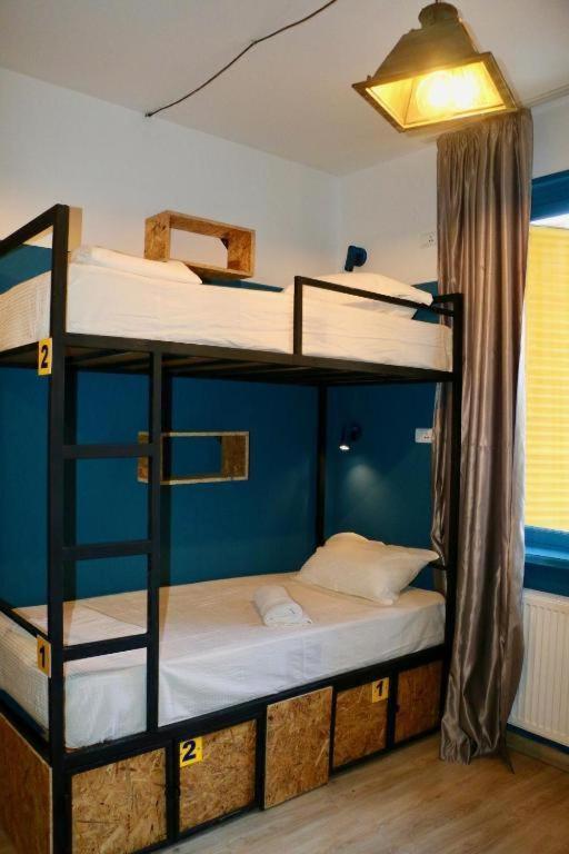 Postel nebo postele na pokoji v ubytování Scary Hostel