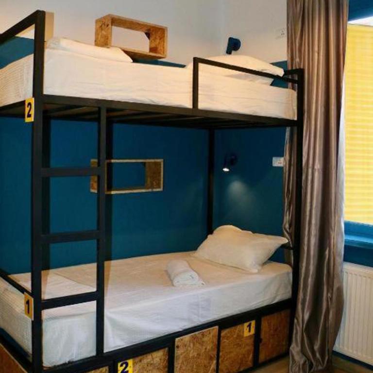 Postel nebo postele na pokoji v ubytování Scary Hostel