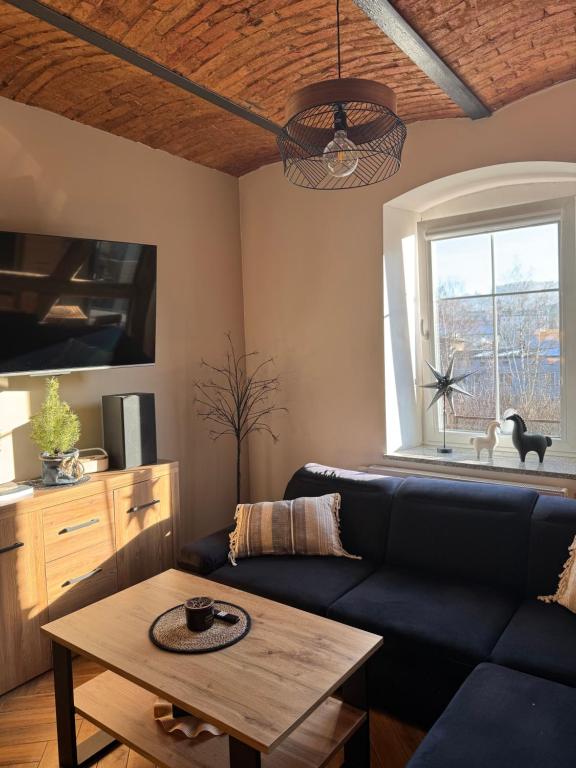 Posedenie v ubytovaní Dawna Mleczarnia Apartamenty LOFT