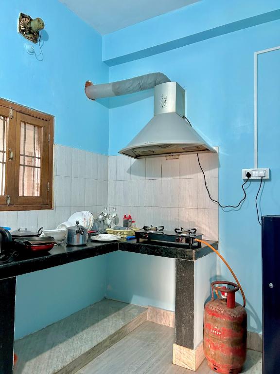 Kuchyň nebo kuchyňský kout v ubytování Riverside Homestay