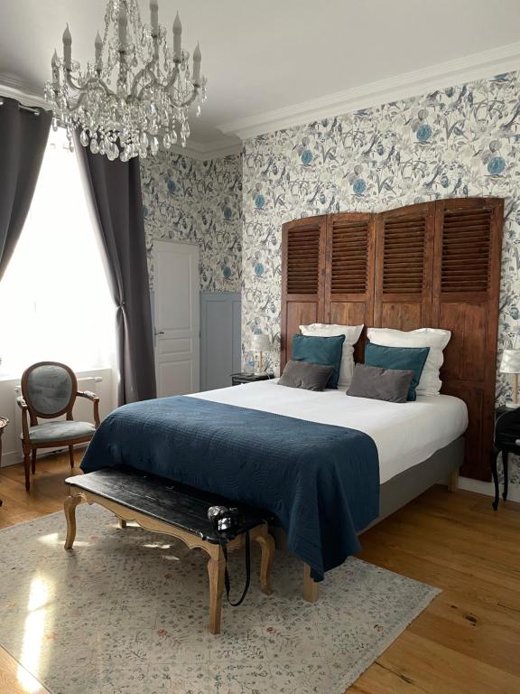 Postel nebo postele na pokoji v ubytování La Boulonnaise