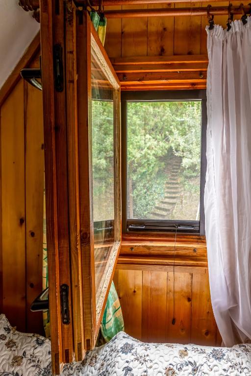 Fotografie z fotogalerie ubytování Tiltott Rengeteg Vendégház v destinaci Balatonfůzfő