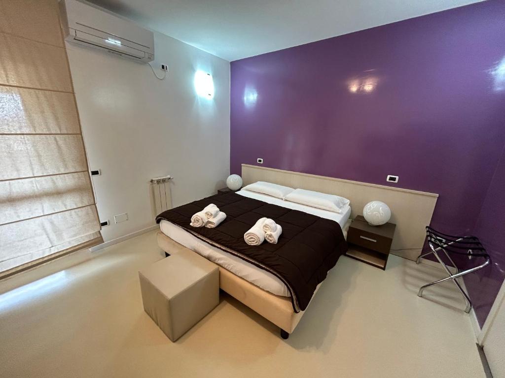 Postel nebo postele na pokoji v ubytování B&B Elia's